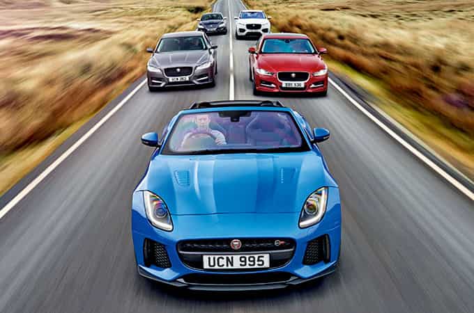 Jaguar's All-Wheel Drive range, drive down a winding road.